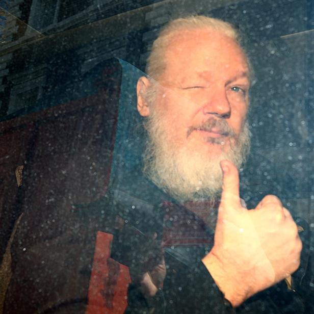 FILE PHOTO: WikiLeaks founder Julian Assange arrives at the Westminster Magistrates Court, after he was arrested  in London