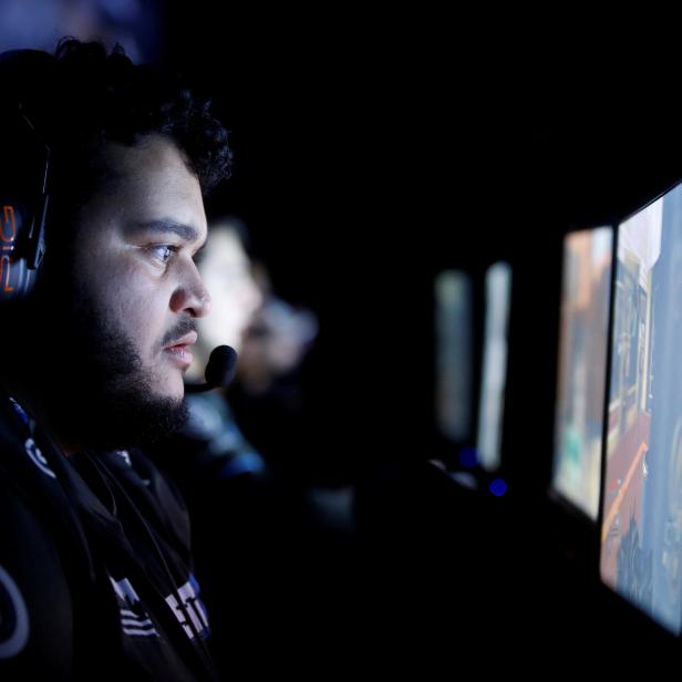 FILE PHOTO: A player from team "SetToDestroyX" competes on his way to winning the finals while playing "Call of Duty: Infinite Warfare" on the Playstation 4, during the Cineplex WorldGaming Canadian Championship Series in Toronto