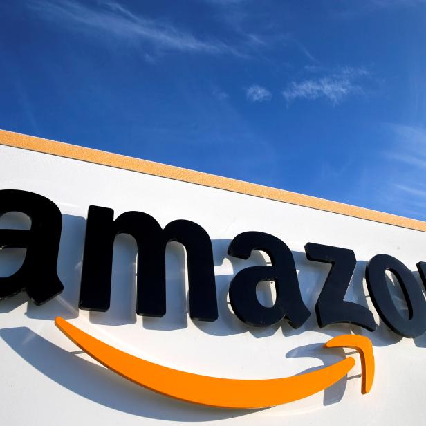 FILE PHOTO: The logo of Amazon is seen at the company logistics centre in Boves, France