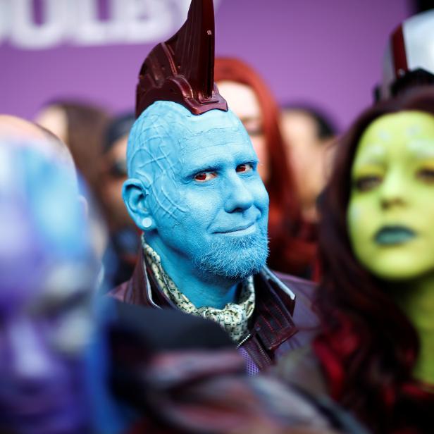 Fans dressed up in costume await the cast members on the red carpet at the world premiere of the film "The Avengers: Endgame" in Los Angeles