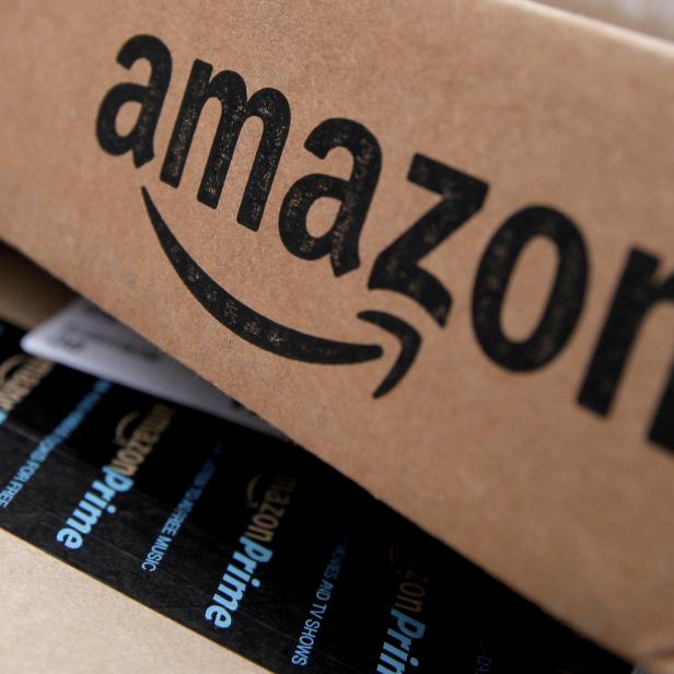 FILE PHOTO: Amazon boxes are seen stacked for delivery in the Manhattan borough of New York City