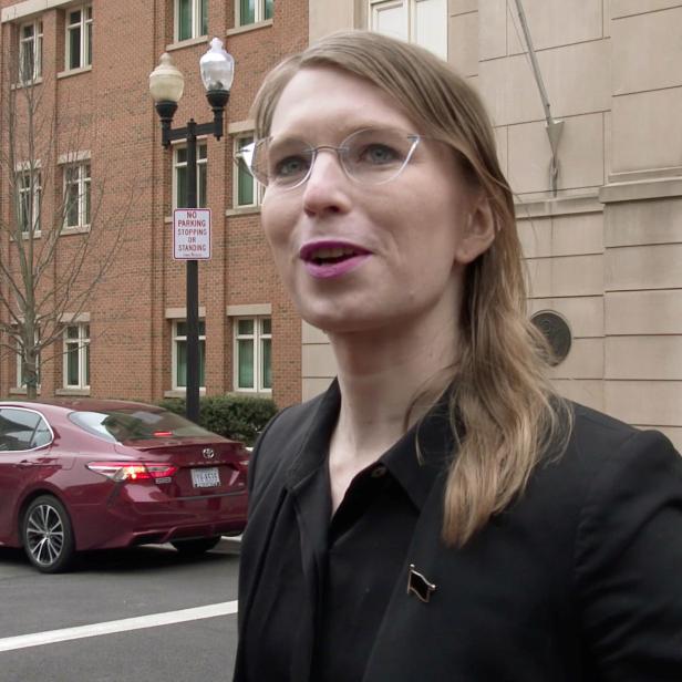 Chelsea Manning speaks to reporters outside the U.S. federal courthouse shortly before appearing before a federal judge and being taken into custody for contempt of court in Alexandria, Virginia