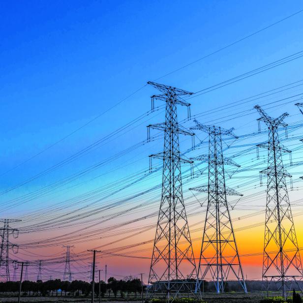 high voltage post,High voltage tower sky background