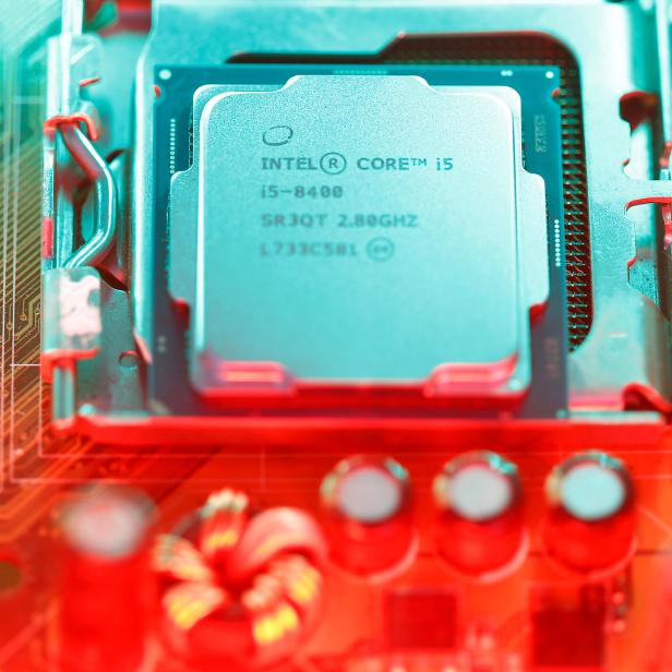 Intel's 8th generation Core i5 processor is seen on the computer's motherboard in this illustration