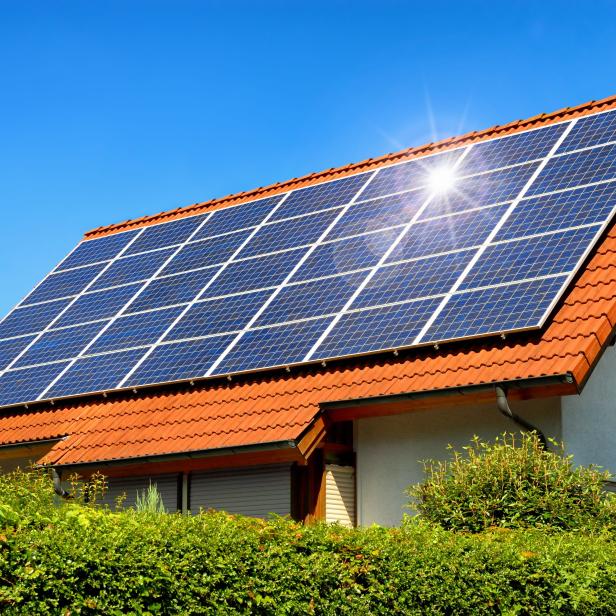 Solar panel on a red roof