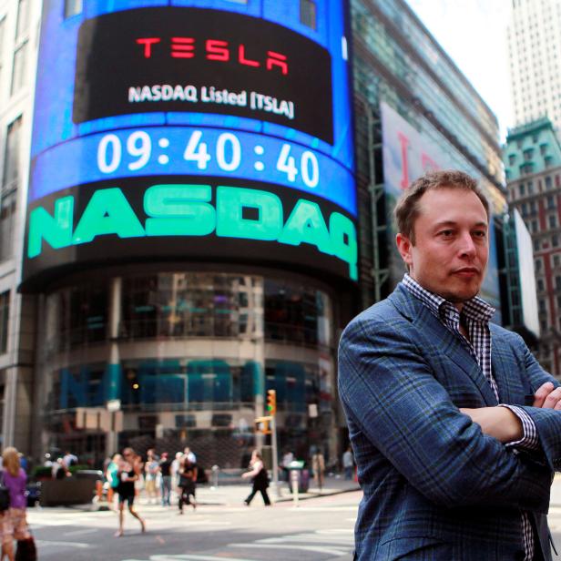 FILE PHOTO: CEO of Tesla Motors Elon Musk poses during a television interview after his company's initial public offering at the NASDAQ market in New York