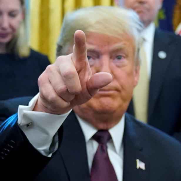 U.S. President Trump talks to reporters at Cybersecurity and Infrastructure signing ceremony in Oval Office of White House in Washington