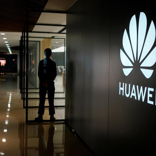 A Huawei company logo is seen at a shopping mall in Shanghai