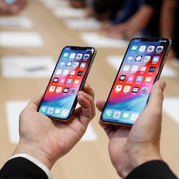 FILE PHOTO: A demonstration of the newly released Apple products is seen following the product launch event in Cupertino