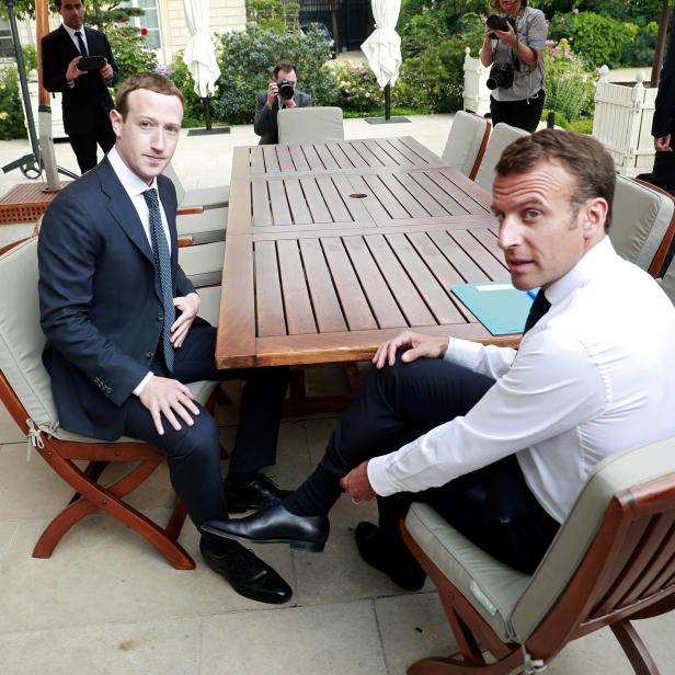 FILE PHOTO: Facebook's founder and CEO Mark Zuckerberg meets with French President Emmanuel Macron at the Elysee Palace after the "Tech for Good" summit, in Paris