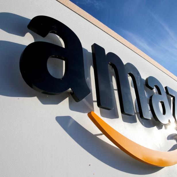 FILE PHOTO: The logo of Amazon is seen at the company logistics centre in Boves