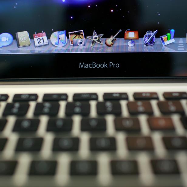 The keyboard and applications on an Apple MacBook Pro are shown at the Apple retail store in San Francisco