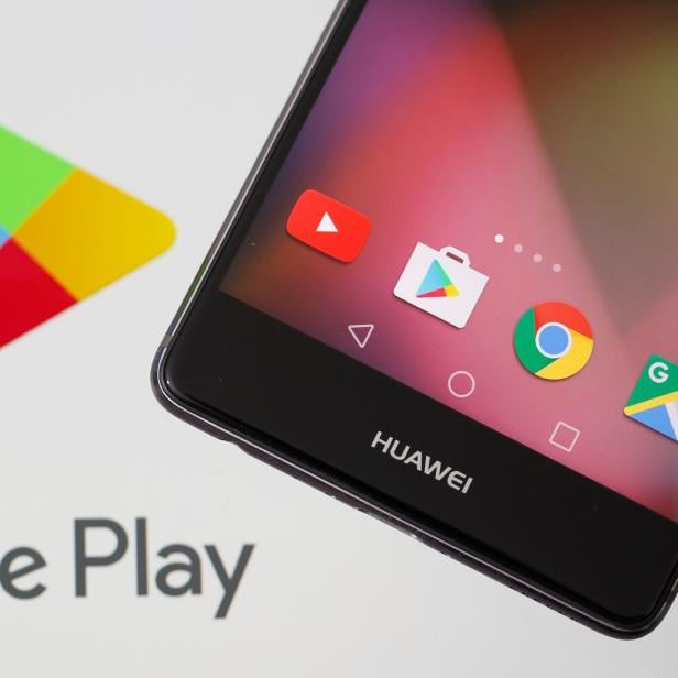 A Huawei smartphone is seen in front of displayed Google Play logo in this illustration picture