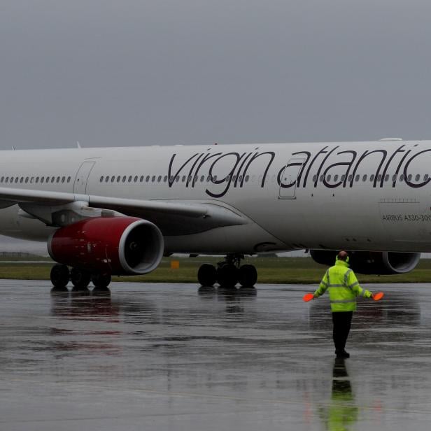 FILE PHOTO: A Virgin Atlantic plane arrives at Liverpool John Lennon Airport in Liverpool northern England.