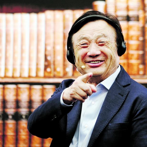 Huawei founder Ren Zhengfei attends a panel discussion at the company headquarters in Shenzhen