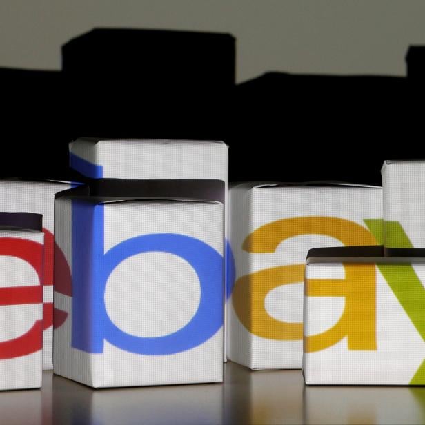 FILE PHOTO: FILE PHOTO: An eBay logo is projected onto white boxes in this illustration picture taken in Warsaw