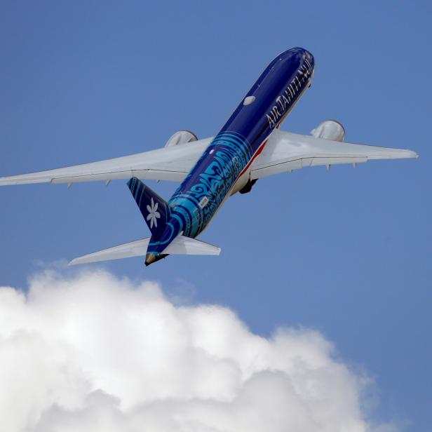 An Boeing 787-9 Dreamliner of Air Tahiti Nui performs during the 53rd International Paris Air Show at Le Bourget Airport near Paris