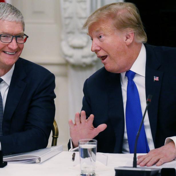 Apple CEO Cook and U.S. President Trump participate in American Workforce Policy Advisory Board meeting at the White House in Washington