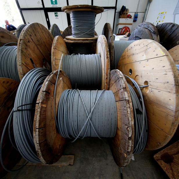 FILE PHOTO: Reels of optical fiber cables are seen in a storage area in Perugia