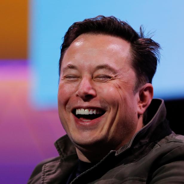 SpaceX owner and Tesla CEO Elon Musk smiles during a conversation with legendary game designer Todd Howard at the E3 gaming convention in Los Angeles