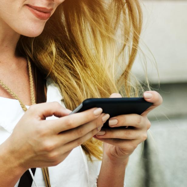 Blond Woman Surfing Internet Concept