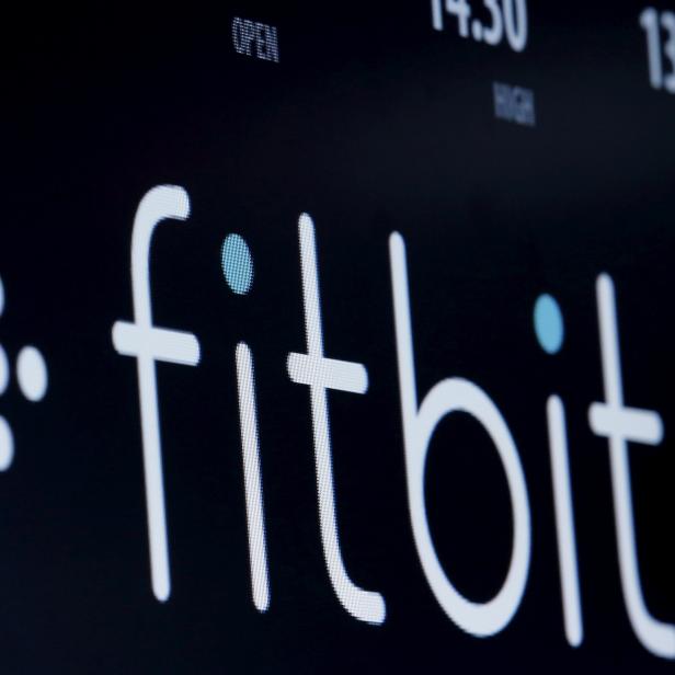 FILE PHOTO: The ticker symbol for Fitbit is displayed at the post where it is traded  on the floor of the NYSE