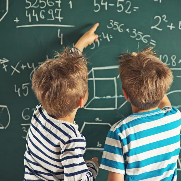 Math is fun - little boys solving mathematical problems