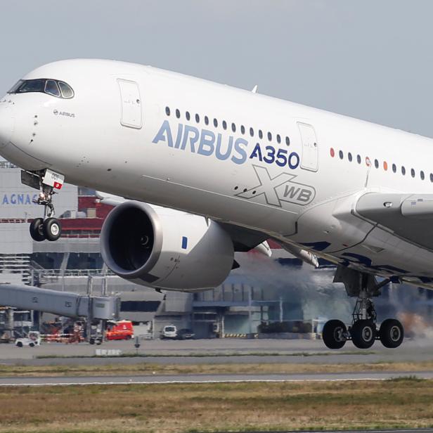 An Airbus A350 takes off at the aircraft builder's headquarters in Colomiers near Toulouse