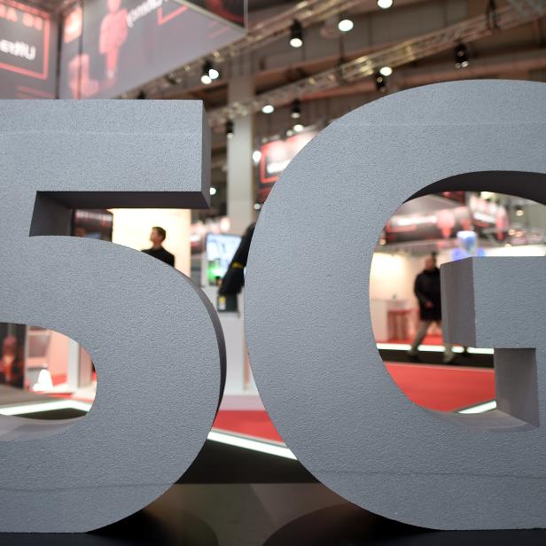 FILE PHOTO: A logo of the upcoming mobile standard 5G is pictured at the Hanover trade fair, in Hanover