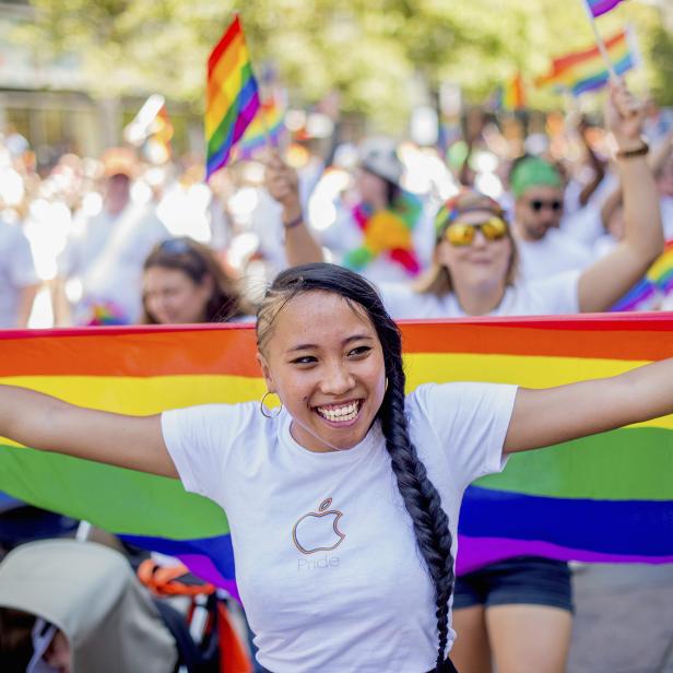 Apple retail employee Minh Phan marches in the San Francisco Gay Pride Festival in California