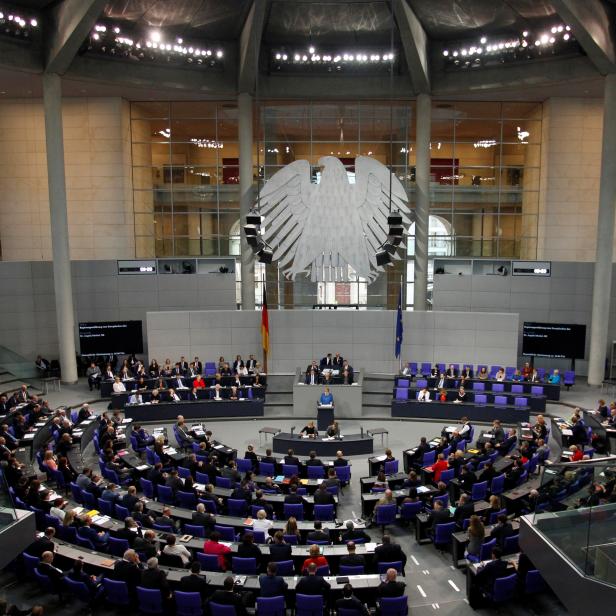 German Chancellor Angela Merkel speaks to members of Germany's lower house of parliament Bundestag in Berlin