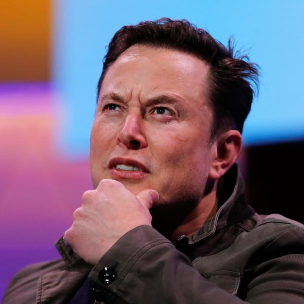 SpaceX owner and Tesla CEO Elon Musk gestures during a conversation with legendary game designer Todd Howard at the E3 gaming convention in Los Angeles