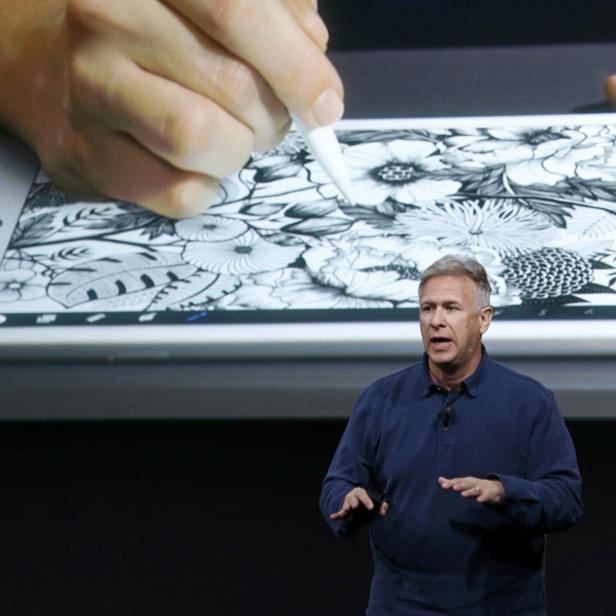 Phil Schiller, senior VP of worldwide marketing for Apple, introduces the iPad Pro with 9.7-inch display during an event at the Apple headquarters in Cupertino, California 