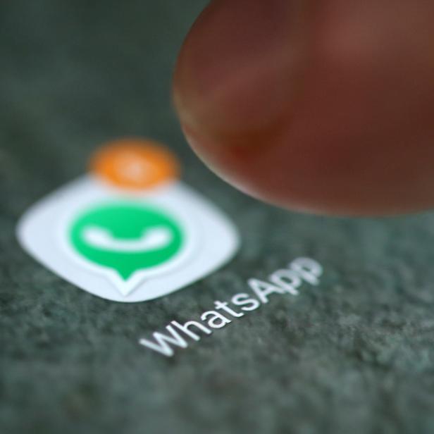 FILE PHOTO: The WhatsApp app logo is seen on a smartphone in this illustration