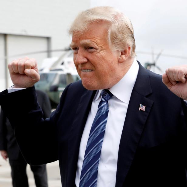 U.S. President Donald Trump gestures after arriving at John Murtha Johnstown-Cambria County Airport in Johnstown after arriving in Pennsylvania