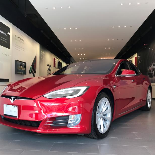 FILE PHOTO: FILE PHOTO: FILE PHOTO: A Tesla Model S car is seen in a showroom in Santa Monica