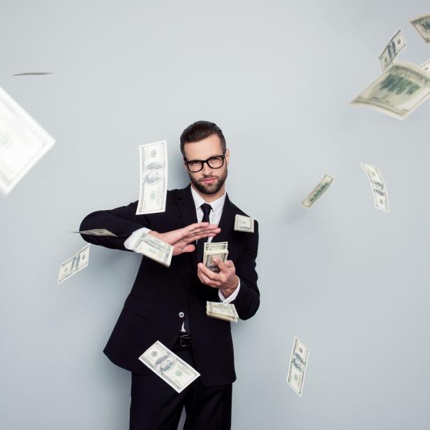 Spectacles jackpot entrepreneur economist banker chic posh manager jacket concept. Handsome confident cunning clever wealthy rich luxury guy holding wasting stack of money isolated on gray background