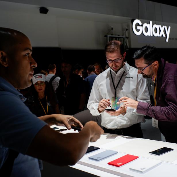 People test new devices during the launch event of the Samsung Galaxy Note 10 at the Barclays Center in Brooklyn, New York