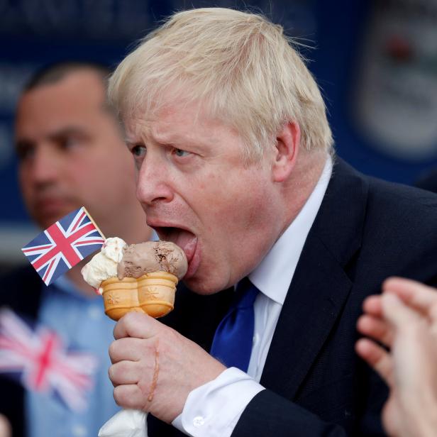 FILE PHOTO: Prime Minister Boris Johnson eats ice cream in Barry Island