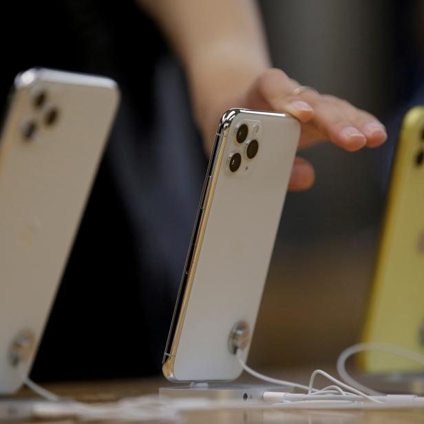FILE PHOTO: Apple's new iPhone 11 Pro Max, 11 Pro and 11 are displayed after they went on sale at the Apple Store in Beijing