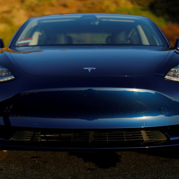 FILE PHOTO: A 2018 Tesla Model 3 electric vehicle is shown in Cardiff, California,