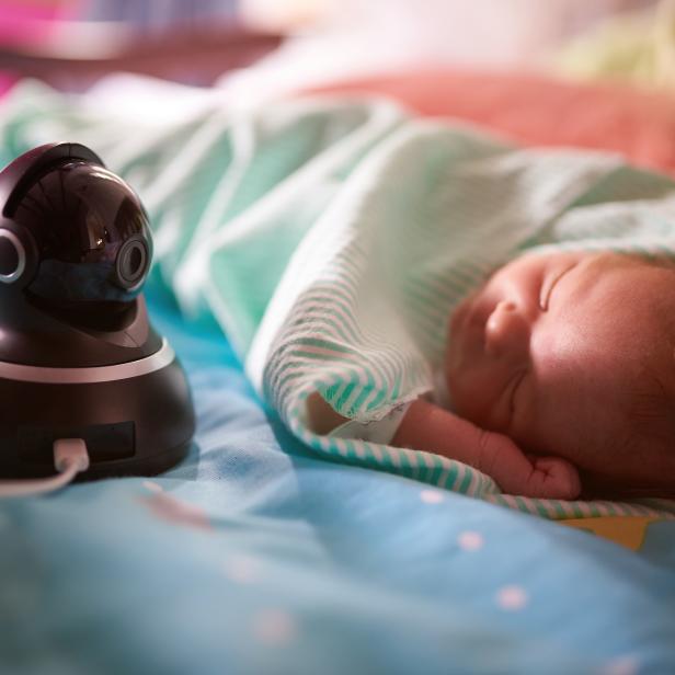 Dome camera watching sleeping baby