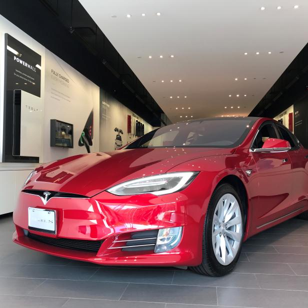 FILE PHOTO: FILE PHOTO: FILE PHOTO: A Tesla Model S car is seen in a showroom in Santa Monica