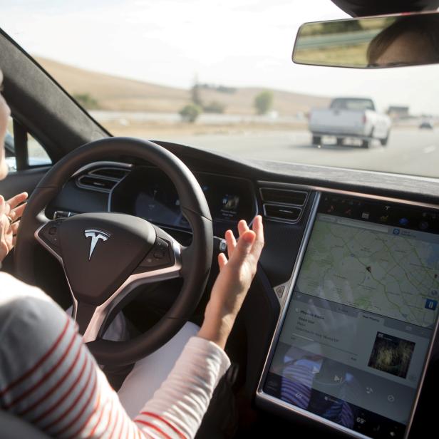 FILE PHOTO -New Autopilot features are demonstrated in a Tesla Model S during a Tesla event in Palo Alto, California