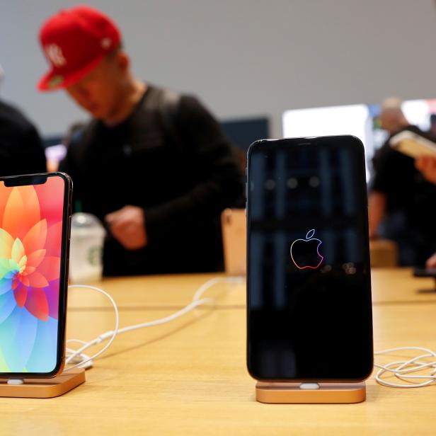 FILE PHOTO: The new Apple iPhone Xs Max and iPhone X are seen on display at the Apple Store in Manhattan, New York