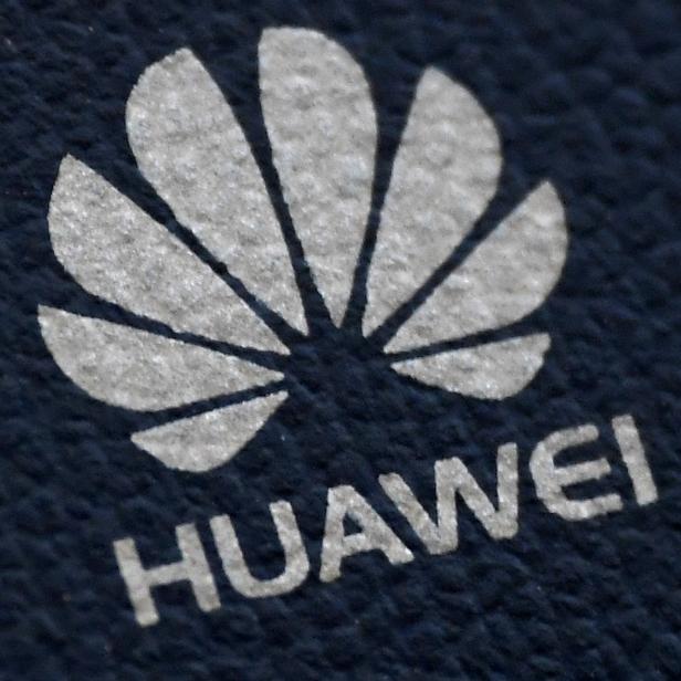 FILE PHOTO: The Huawei logo is seen on a communications device in London, Britain