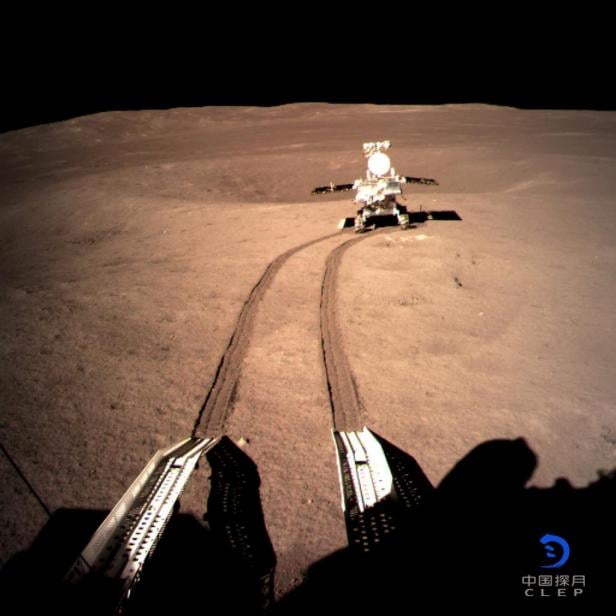 China's lunar rover Yutu-2 or Jade Rabbit 2 rolling onto the far side of the moon taken by the Chang'e-4 lunar probe is seen in this image provided by China National Space Administration