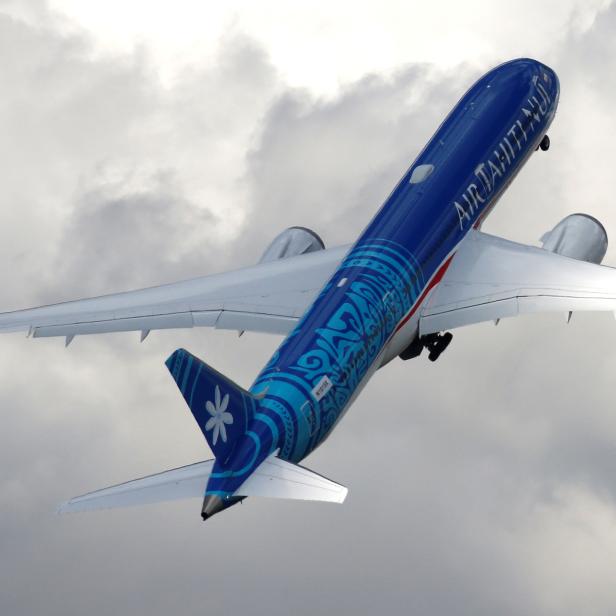 An Boeing 787-9 Dreamliner of Air Tahiti Nui company performs during the 53rd International Paris Air Show at Le Bourget Airport near Paris