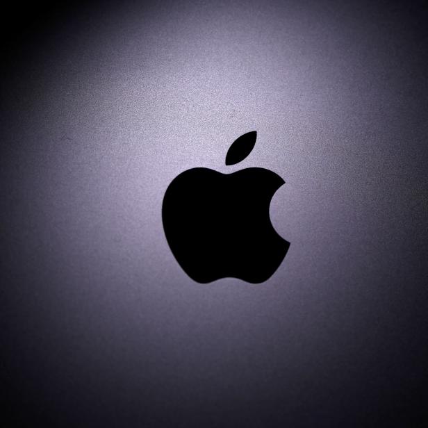 Das Apple-Logo ist auf dem Macbook in dieser Illustration zu sehen.