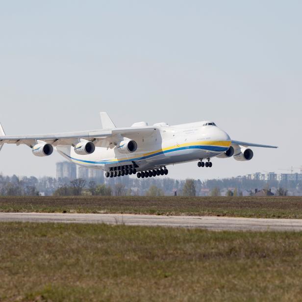 A cargo plane carrying medical equipment from China lands at an airfield outside Kiev